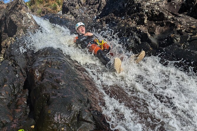 Bruce's Stone Canyoning Adventure. - Getting kitted up: 5mm wetsuit, helmet, and harness seat protection