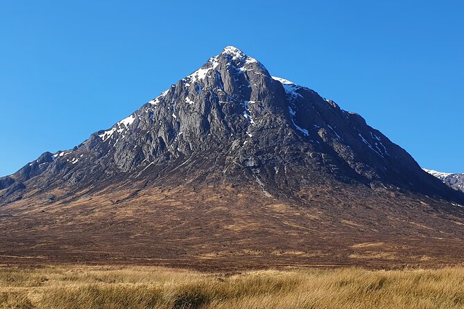 Full Day Private Tour in West Highlands, Oban and Glencoe - Kilchurn Castle: Ruins Outside, Stories Inside, and Highland Cow Odds