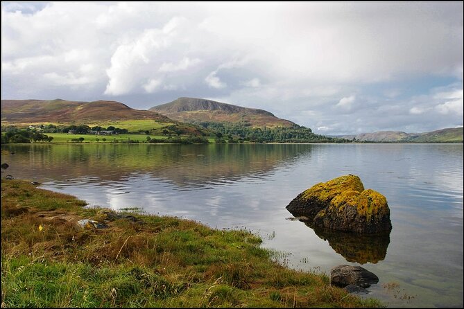 Invergordon cruise excursion Small Group Dunrobin Castle & More - Dornoch: cathedral area walking time and the Witch’s Stone detail