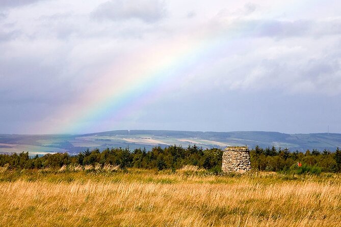 Inverness Highlands Bucket List Tour - Urquhart Castle Ruins: Grant Tower, the Prison Cell Story, and a Trebuchet Replica