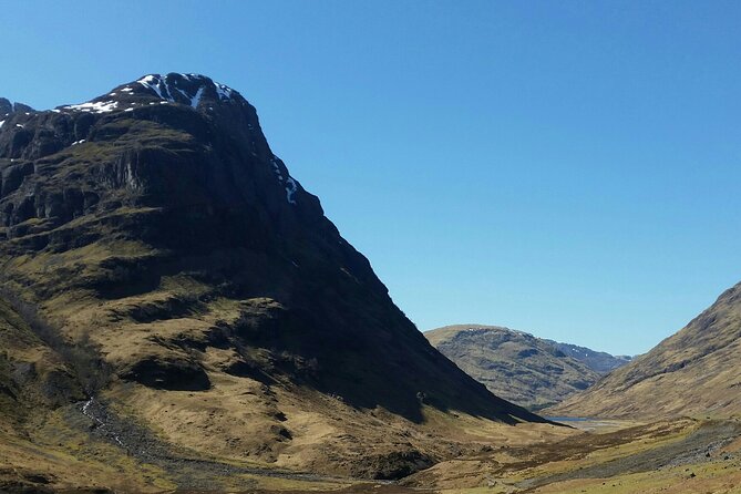 Small Group Loch Ness, Glen Coe & The Highlands from Edinburgh - Stop 1 in Perthshire: local produce tasting and Highland cows