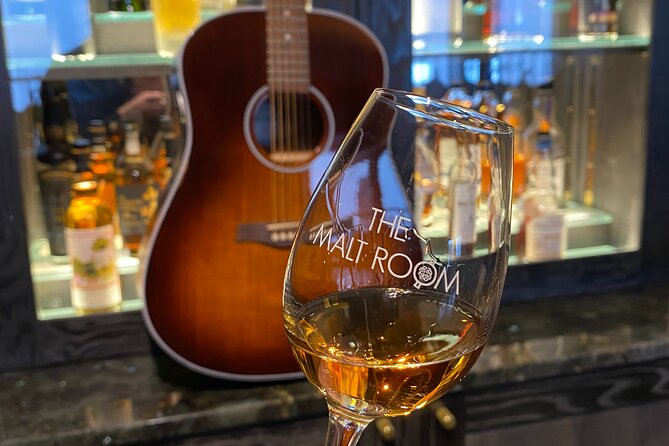 The Malt Room Whisky Gigs - Davy Holt brings the folk music, and it changes the mood