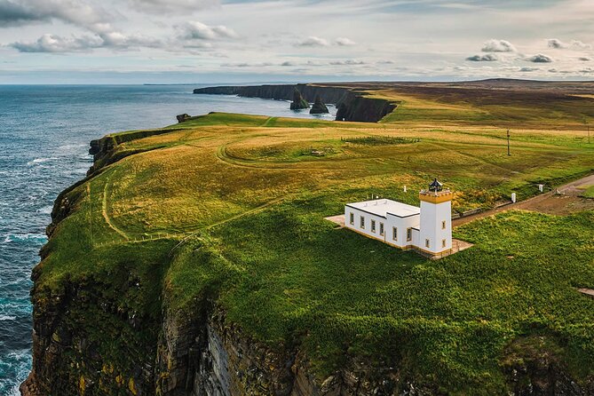 Top Of The Highlands Tour: John O' Groats, Caithness and More - John O’Groats: the signpost photo, coastal history, and wildlife odds